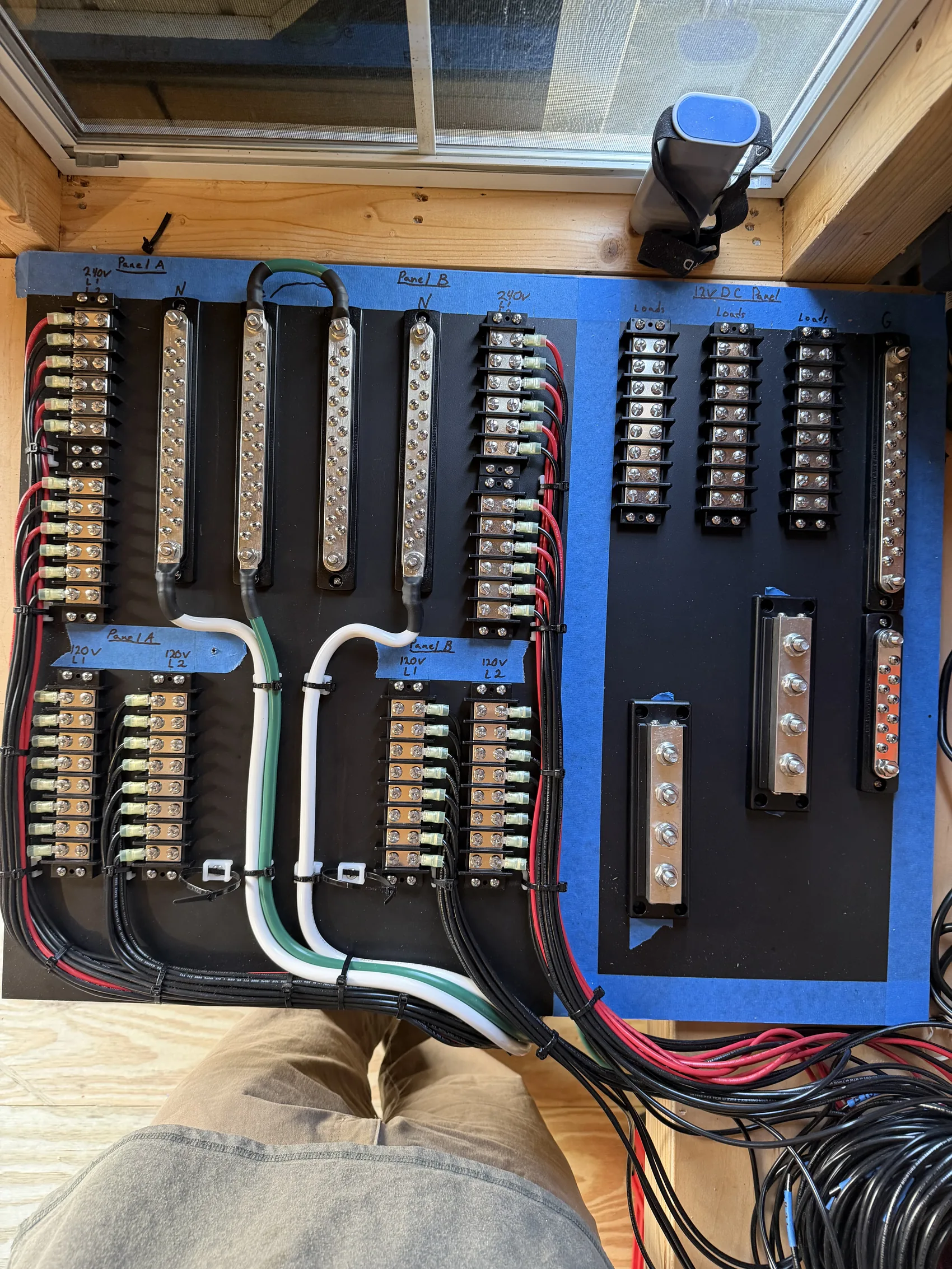 The same custom distribution panel, fully wired and labeled to ABYC standard
